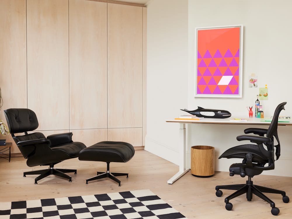 Eames Lounge Chair and Ottoman,  Girard Check Rug,  Nevi Sit to Stand Table,  Aeron Chair,  Eames House Whale,  Nelson Pop Art Triangles Poster,  Risom Wastebasket