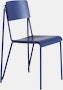 A three quarter side view of a royal blue Petit Standard Chair.