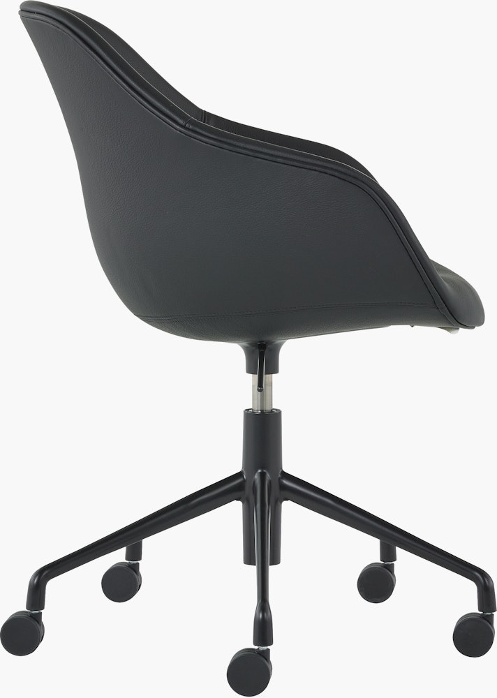 A side view of the AAC 153 About A Chair Task Armchair.