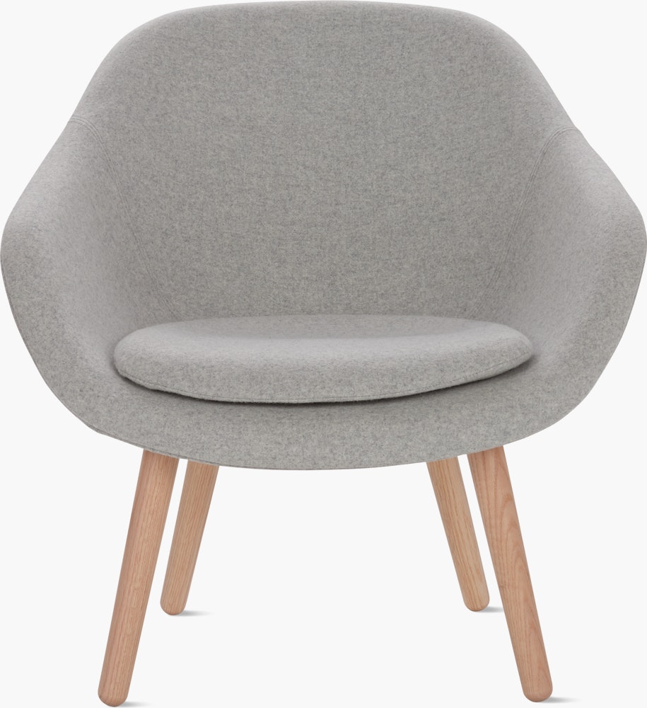 A light grey About a Lounge 82 Armchair with low back viewed from the front