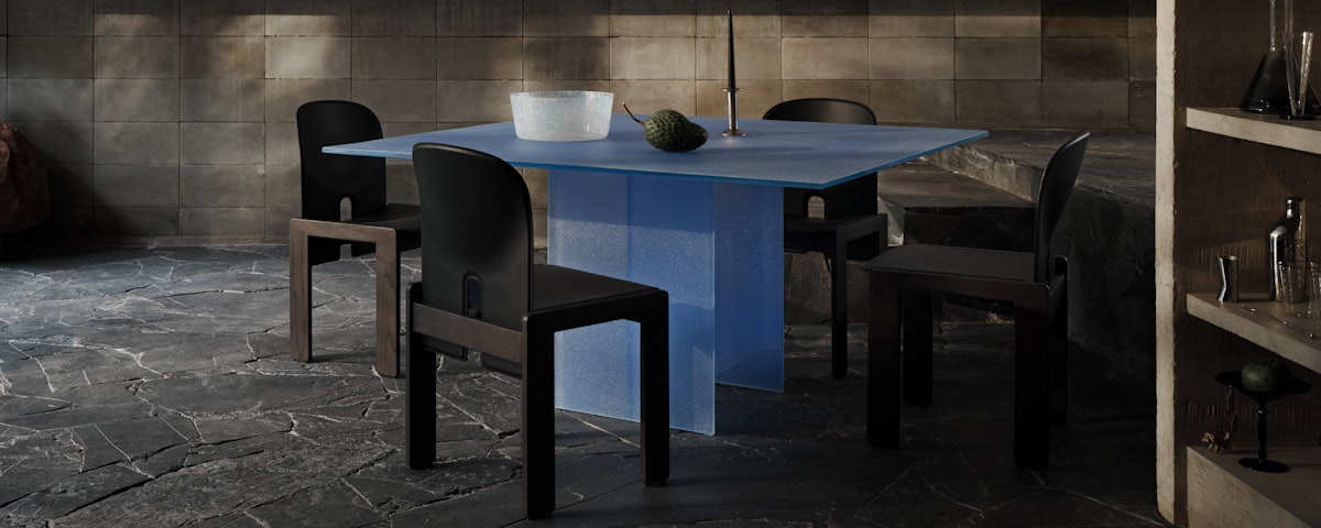 Scarpa Chairs, Simoon Table and Totem Pendant in a dining room setting