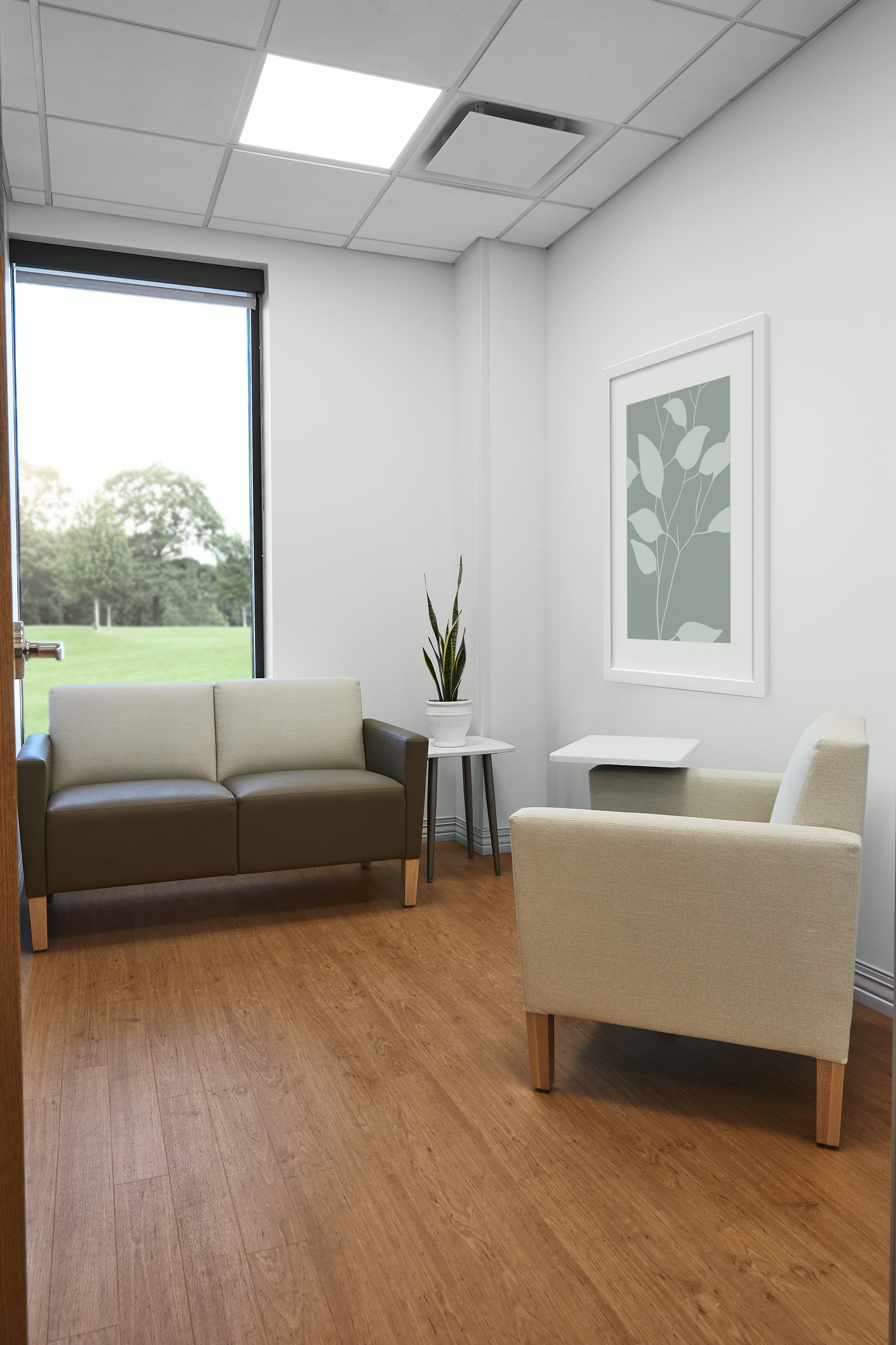 Patient consultation room with Nemschoff Brava Classic arm chair in beige and Brava Classic Multiple Seating in a brown seat and beige back with a Nemschoff Palisade Mobile Table and a Nemschoff Palisade Side Table.