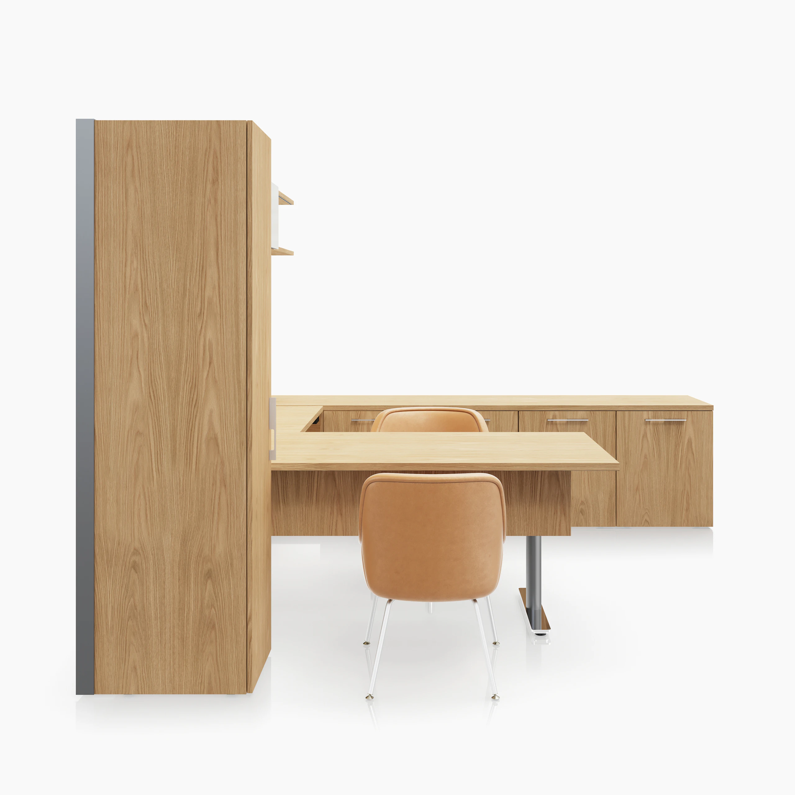 A Geiger One Private Office in Natural Flat Cut Oak with a Bumper Office and Side Chair in camel leather viewed from the side.