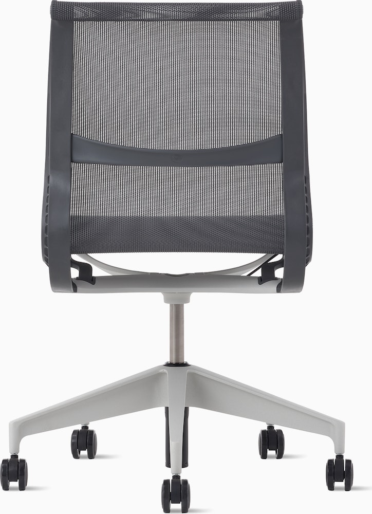 Rear view of a Setu chair without arms in grey.