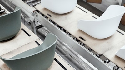 About A Chairs by HAY in white and dusty green, being assembled.