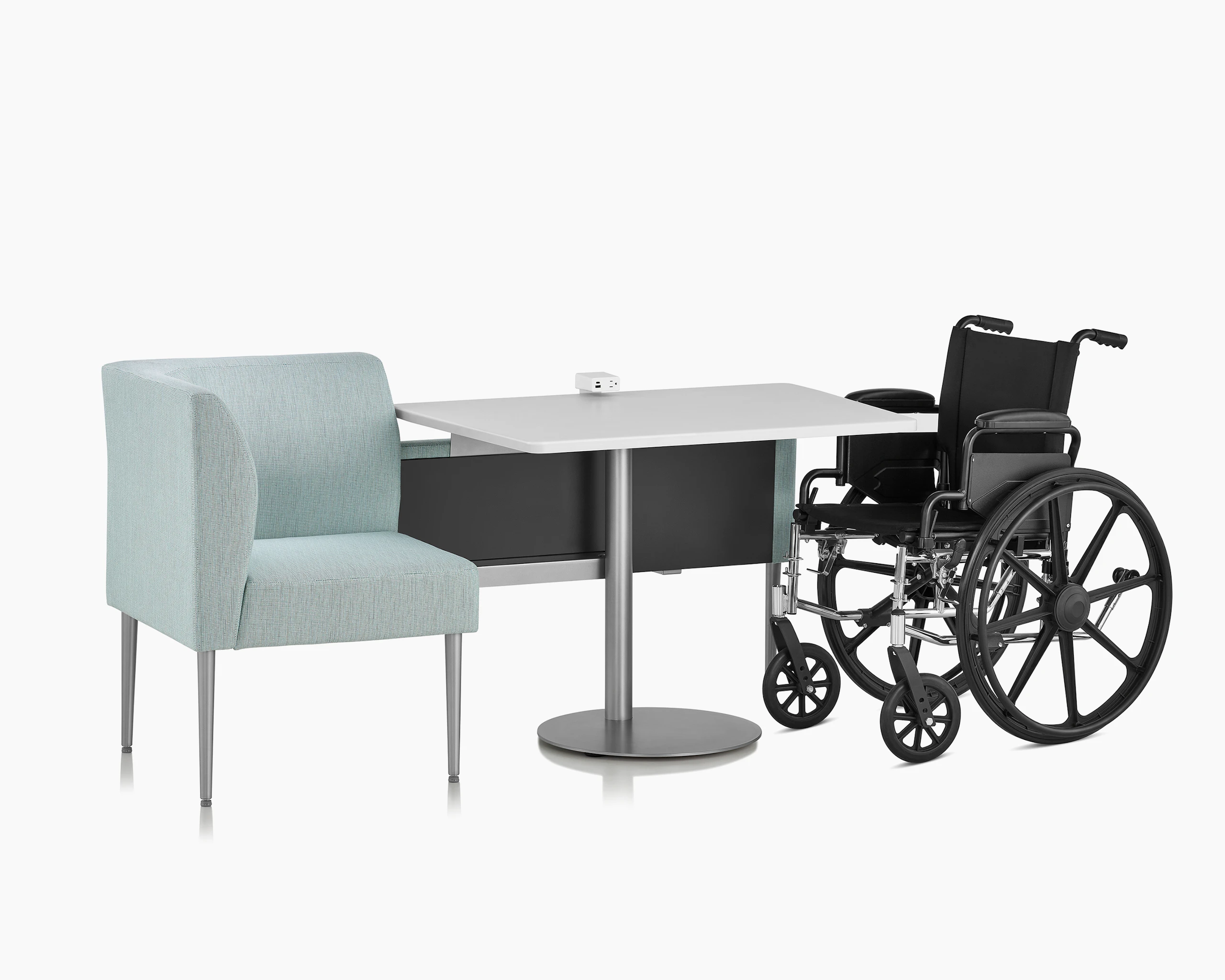 Front three-quarter view of Palisade Booth with wheelchair on white sweep.