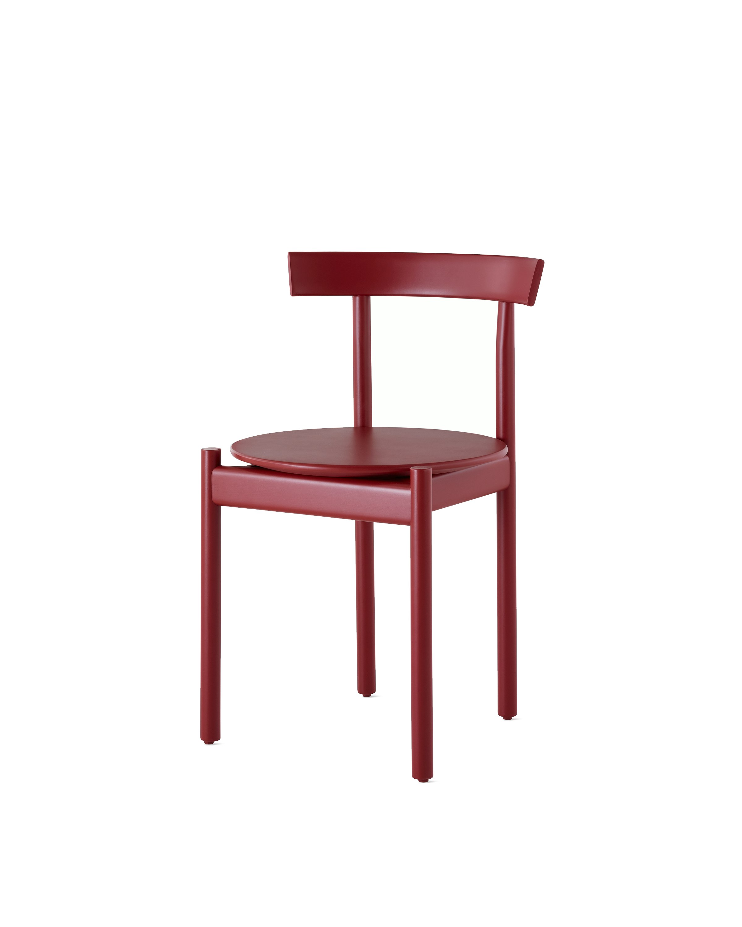A red Comma Chair, viewed from the front at an angle.