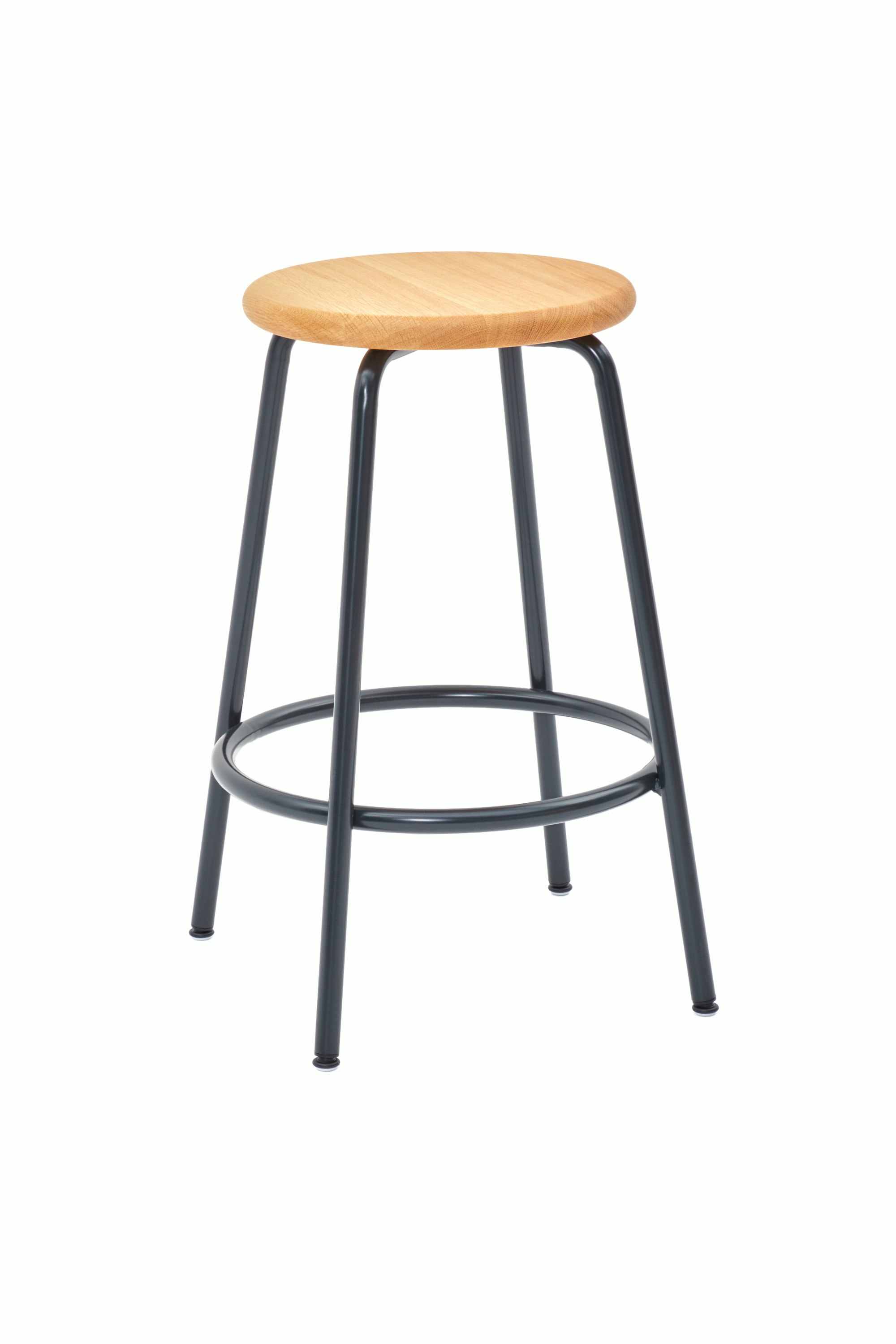 A Penny Stool with a black base and oak seat.