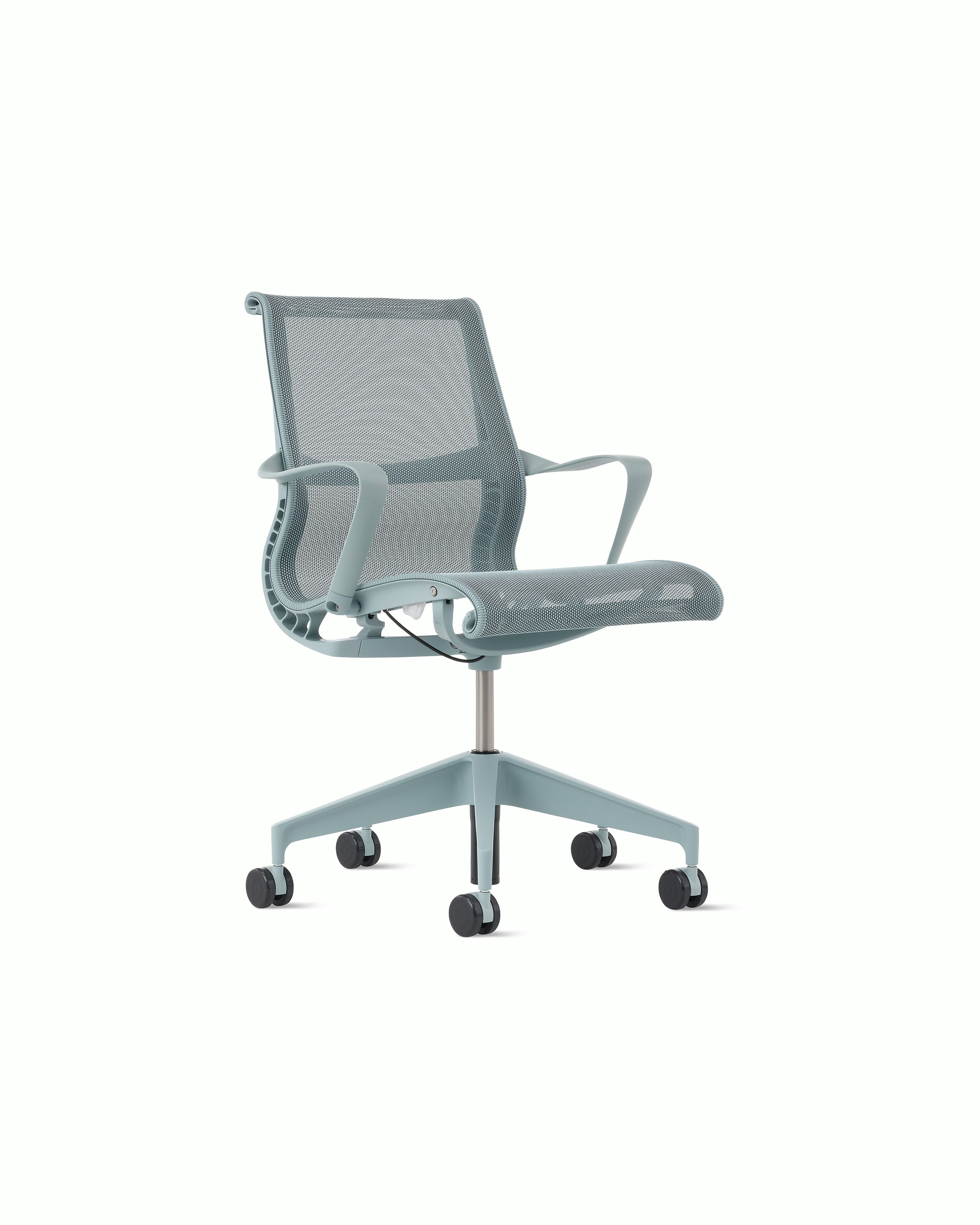Front angle view of a Setu chair with fixed arms in light blue.