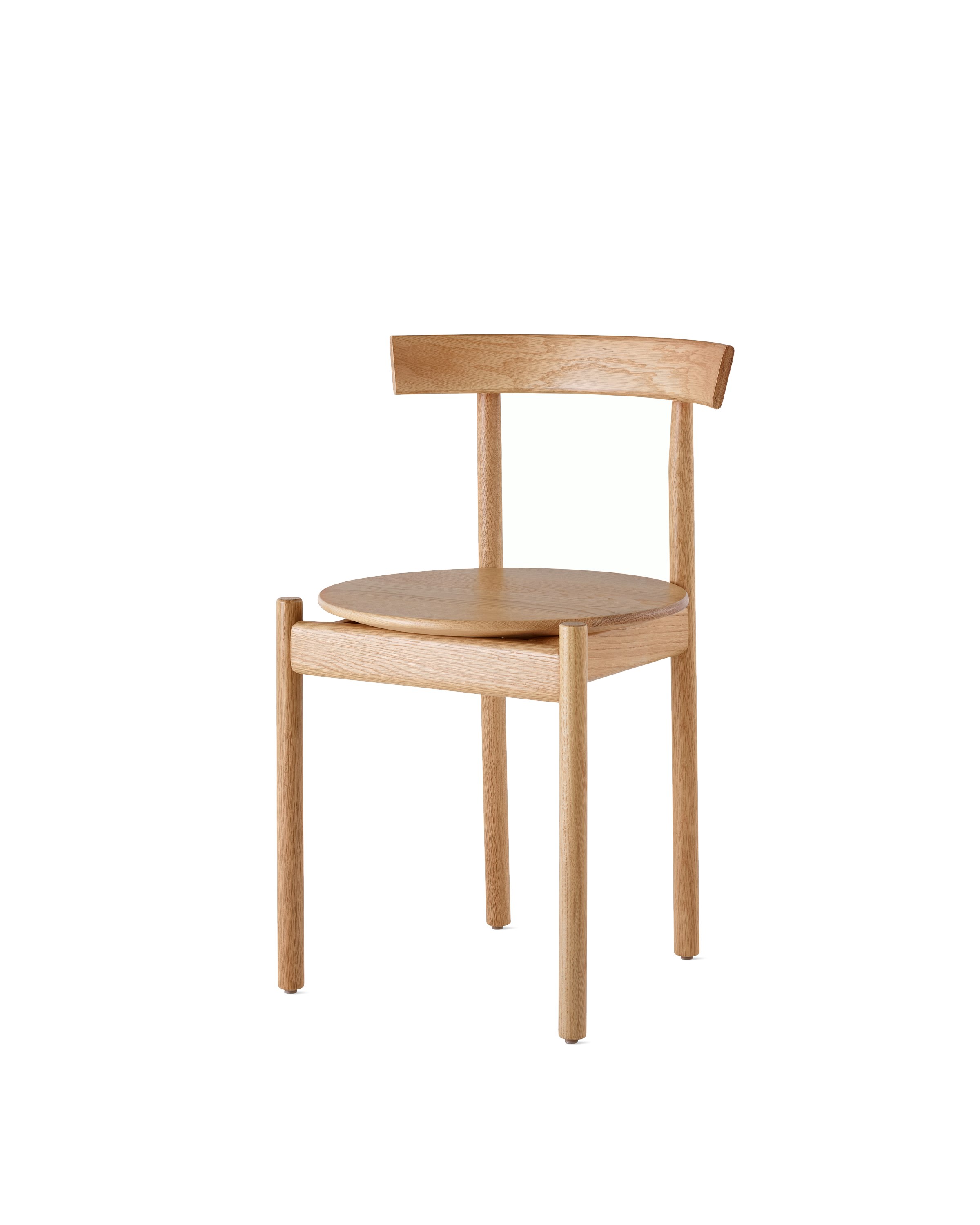 An oak Comma Chair, viewed from the front at an angle.