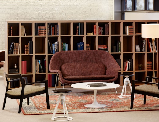 Knoll Essentials anchor storage open lockers Saarinen table Krusin lounge chair Womb settee Piton stool Saarinen Executive Armless chair Community Space Activity Space Library