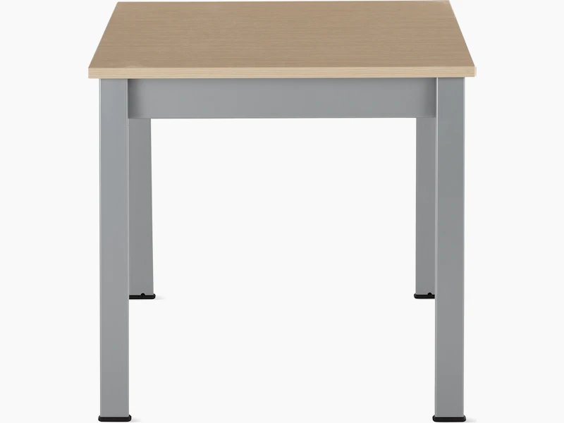 Front view of an Easton Side Table with a clear on ash laminate top and metallic silver legs.