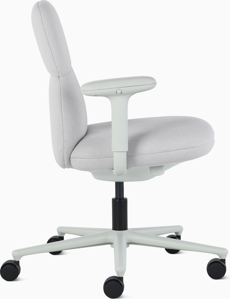 Side view of a mid-back Asari chair by Herman Miller in light grey with height adjustable arms.