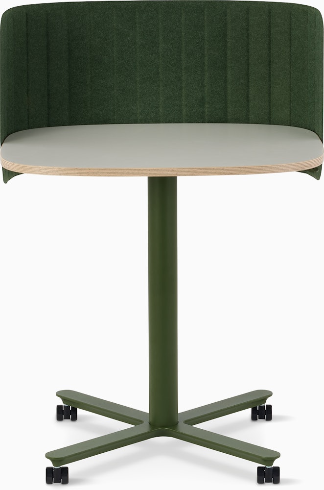 Passport Work Table with white surface, plywood edge, and olive base on casters, shown with a green screen.