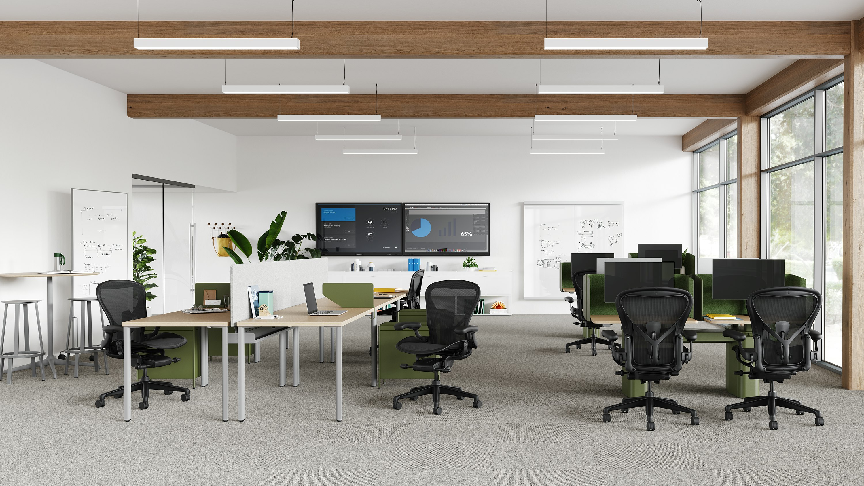 Aeron onyx chairs with olive accent OE1 desks and micro-packs in a collaborative room.