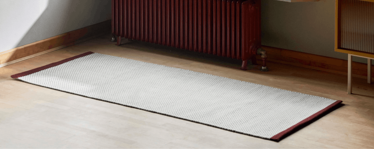 Bias Runner on a wood floor next to a radiator