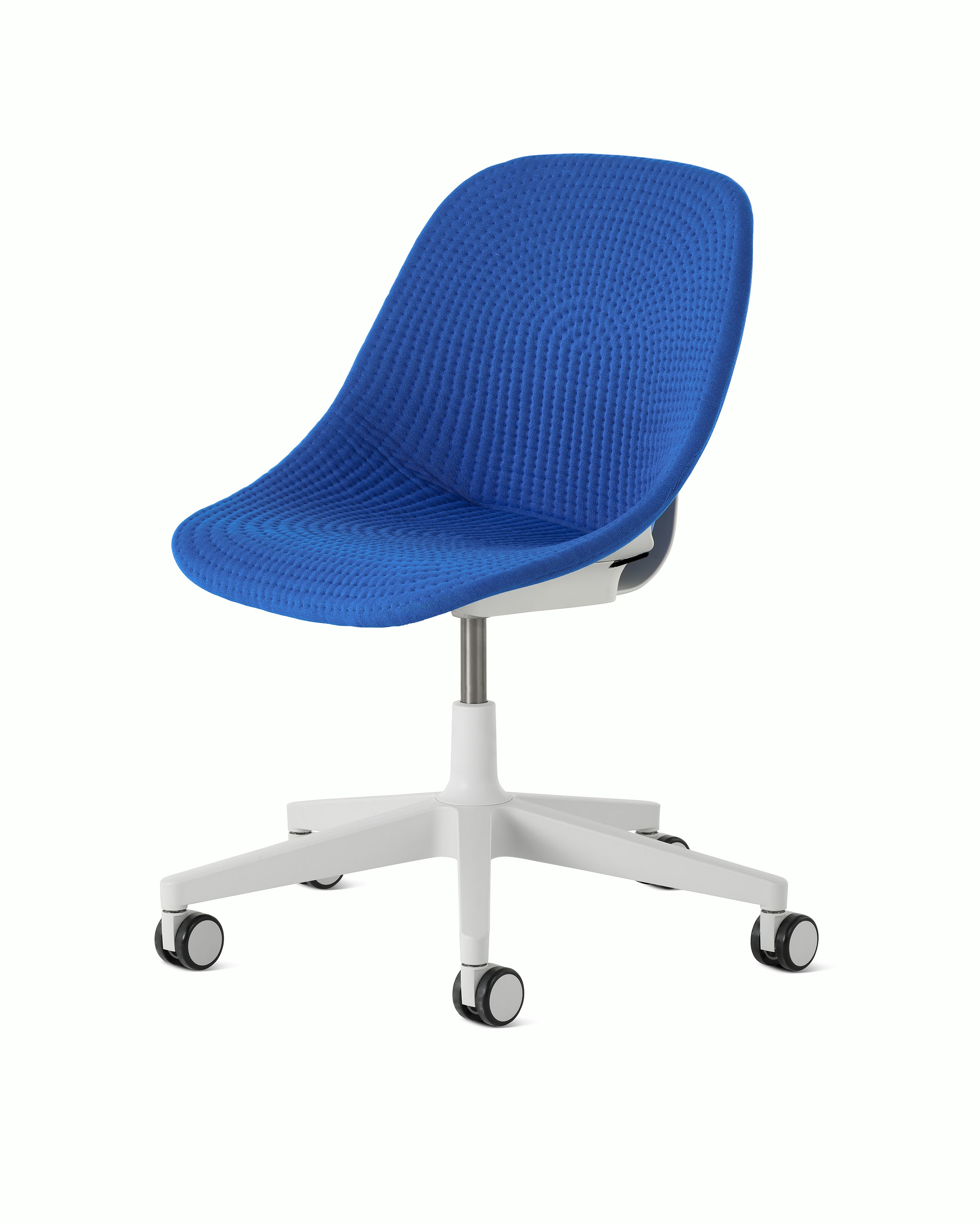 Front angle view of a Zeph chair with no arms in light grey. with a Depp blue knit cover