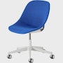 Front angle view of a Zeph chair with no arms in light grey. with a Depp blue knit cover