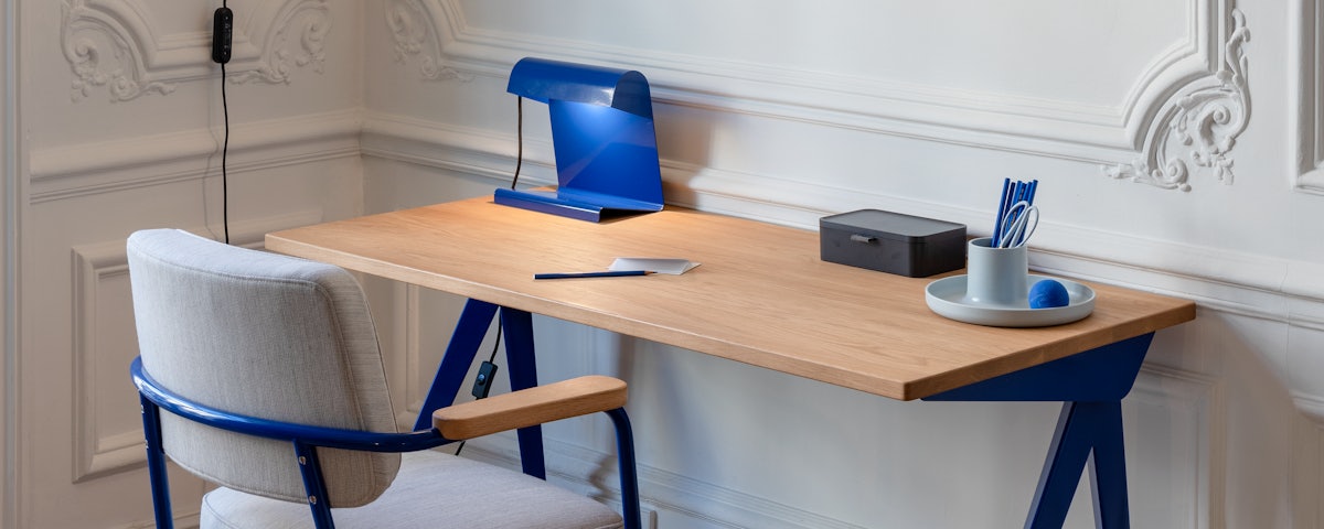 Lampe De Bureau on a Prouvé Compas Direction Desk in a home office setting