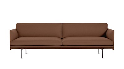 A brown Outline Sofa by Muuto