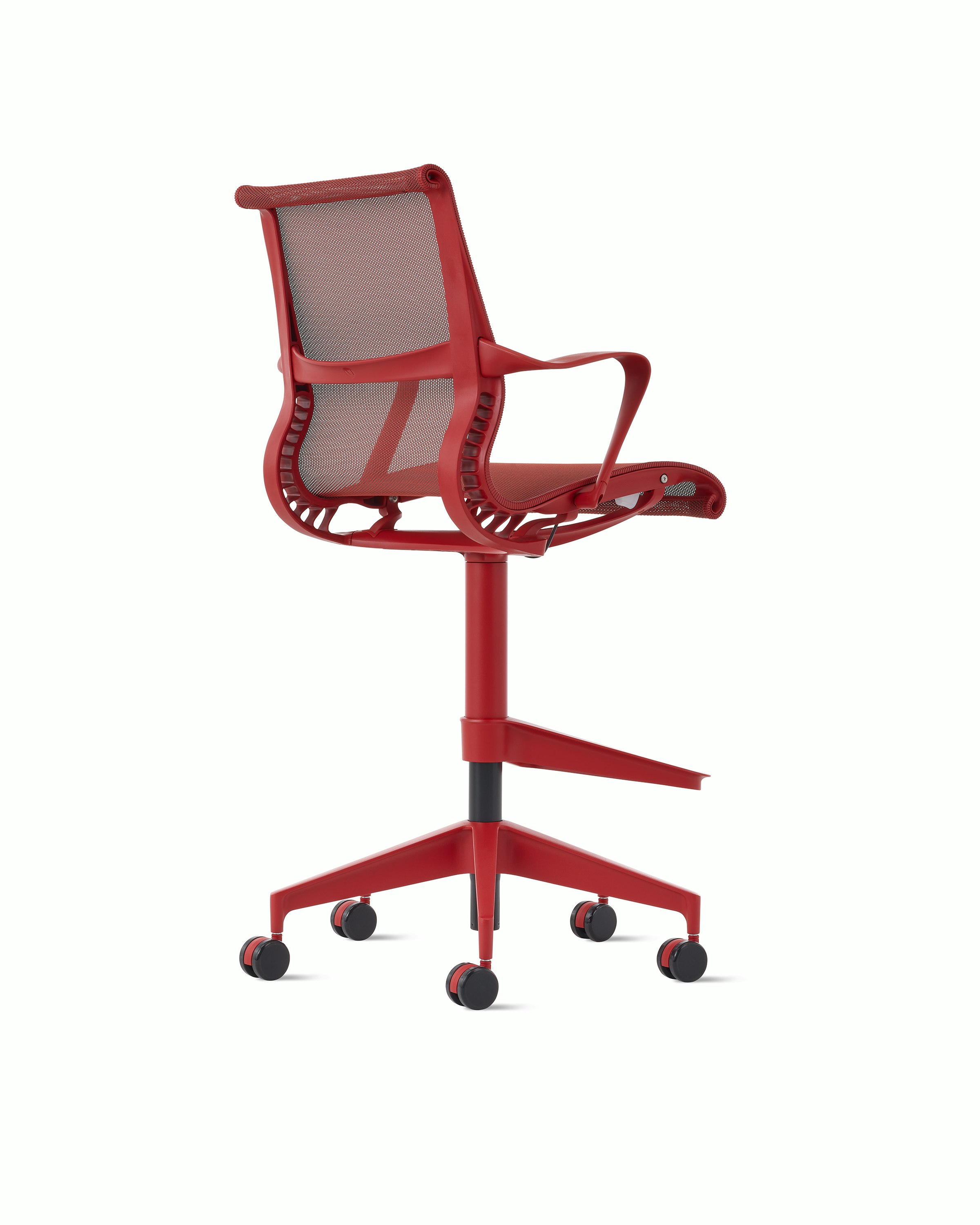 Rear angle view of a Setu stool with fixed arms in red.