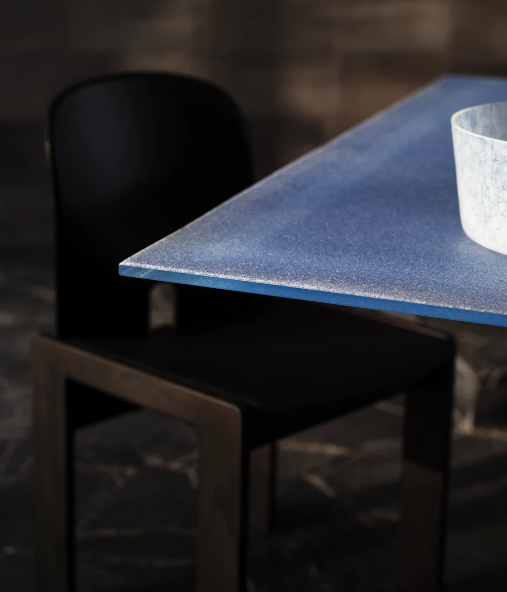 Blue side panel of table showing textured finish