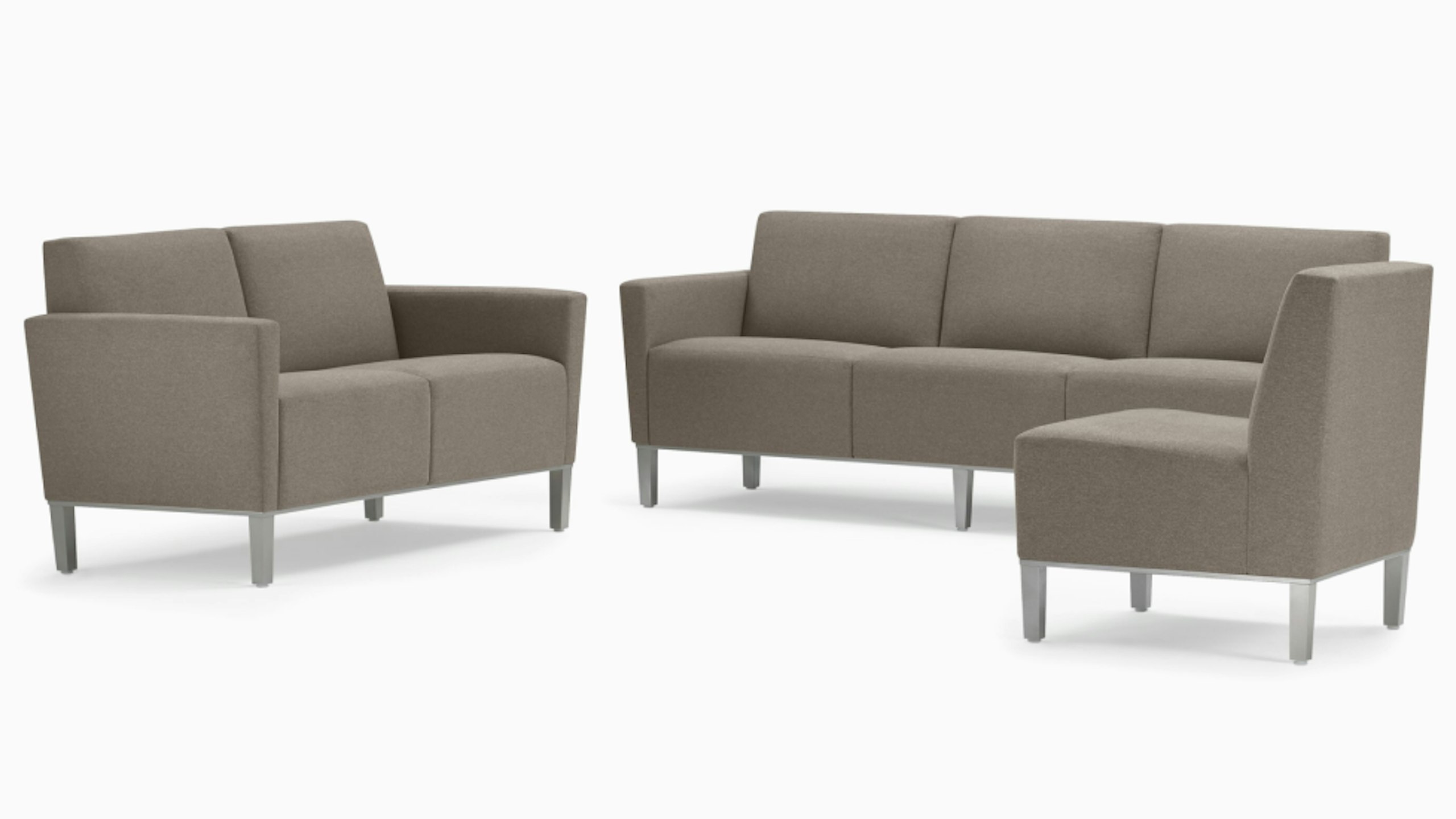 Family shot of Brava Platform Lounge System consisting of one chair, two seat and three seat on metal base.