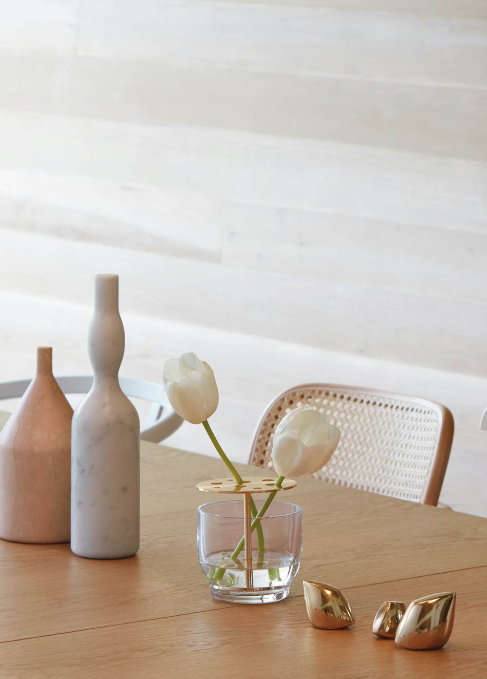 Ikebana Vase holding tulips on a table