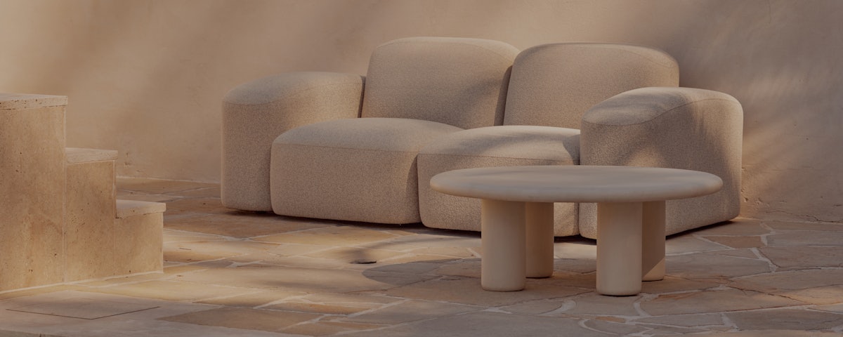 Muse Outdoor Sofa and Earth Outdoor Coffee Table at a poolside setting