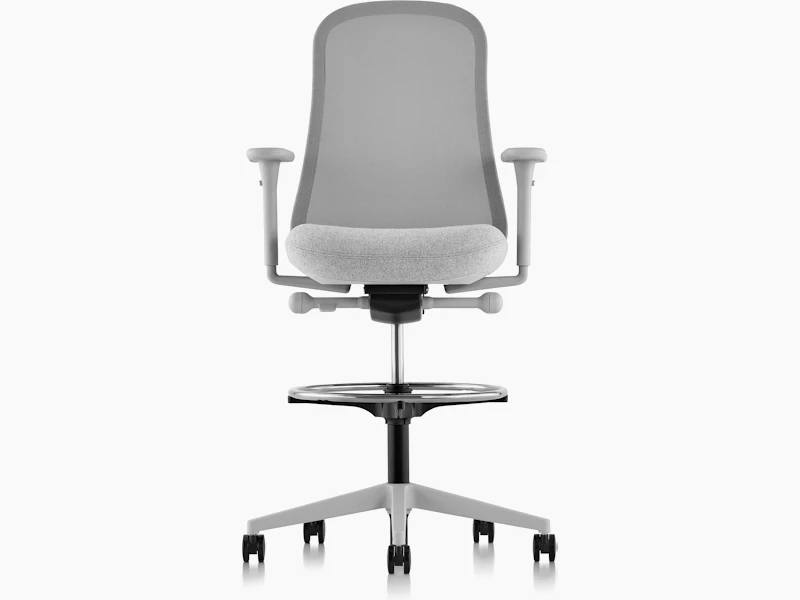 Light grey Lino Stool with a suspension back and upholstered seat, viewed from the front.