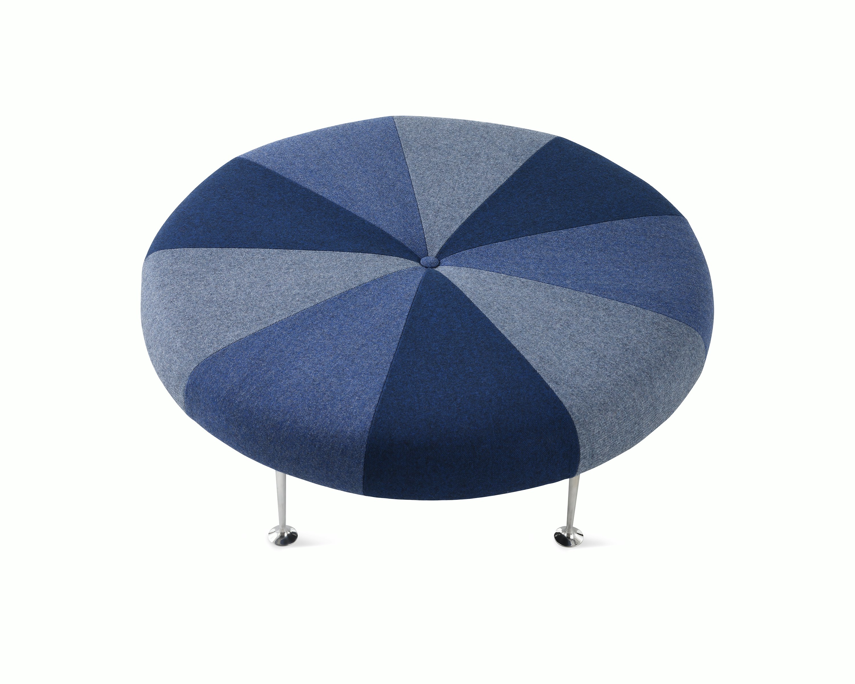 A Girard Color Wheel Ottoman upholstered in blue fabrics, viewed from the top. 