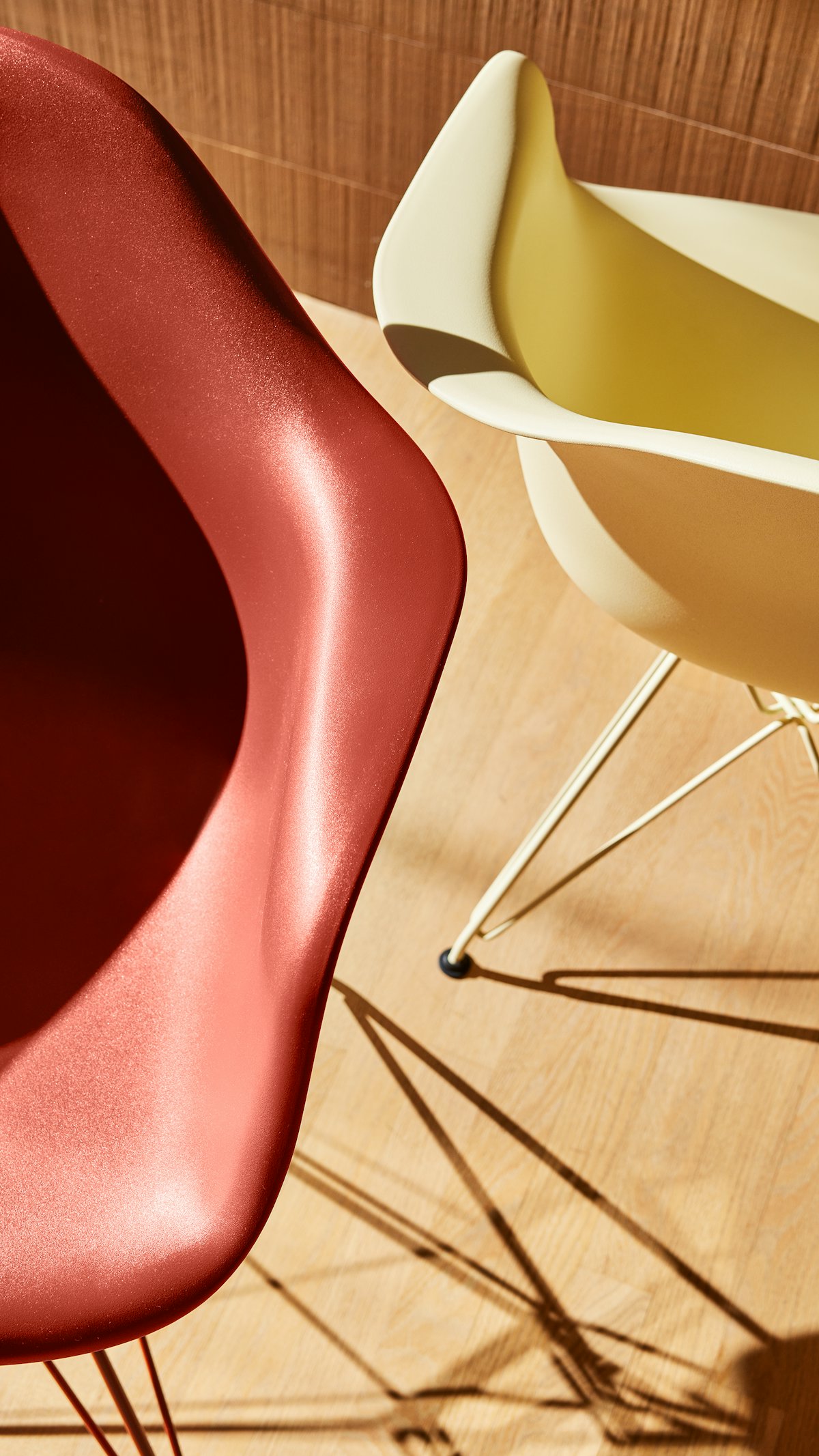 Herman Miller x  HAY, Eames Molded Plastic Armchair details of iron red and yellow