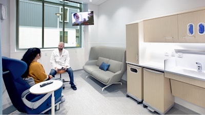 A doctor and patient sitting in a patient room at BAMF Health