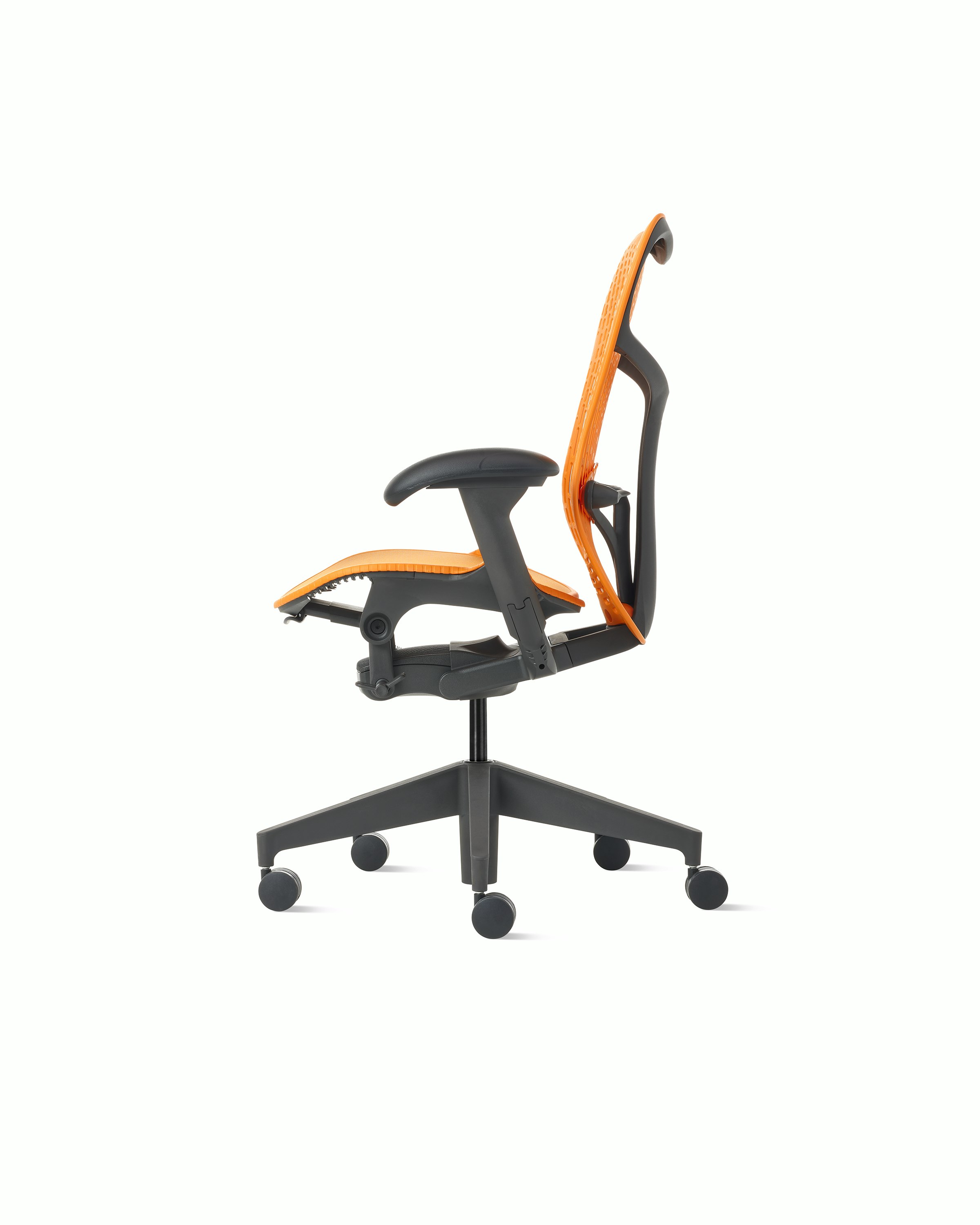 Side  view of a Mirra2 chair with a Trflex back in ochre. 