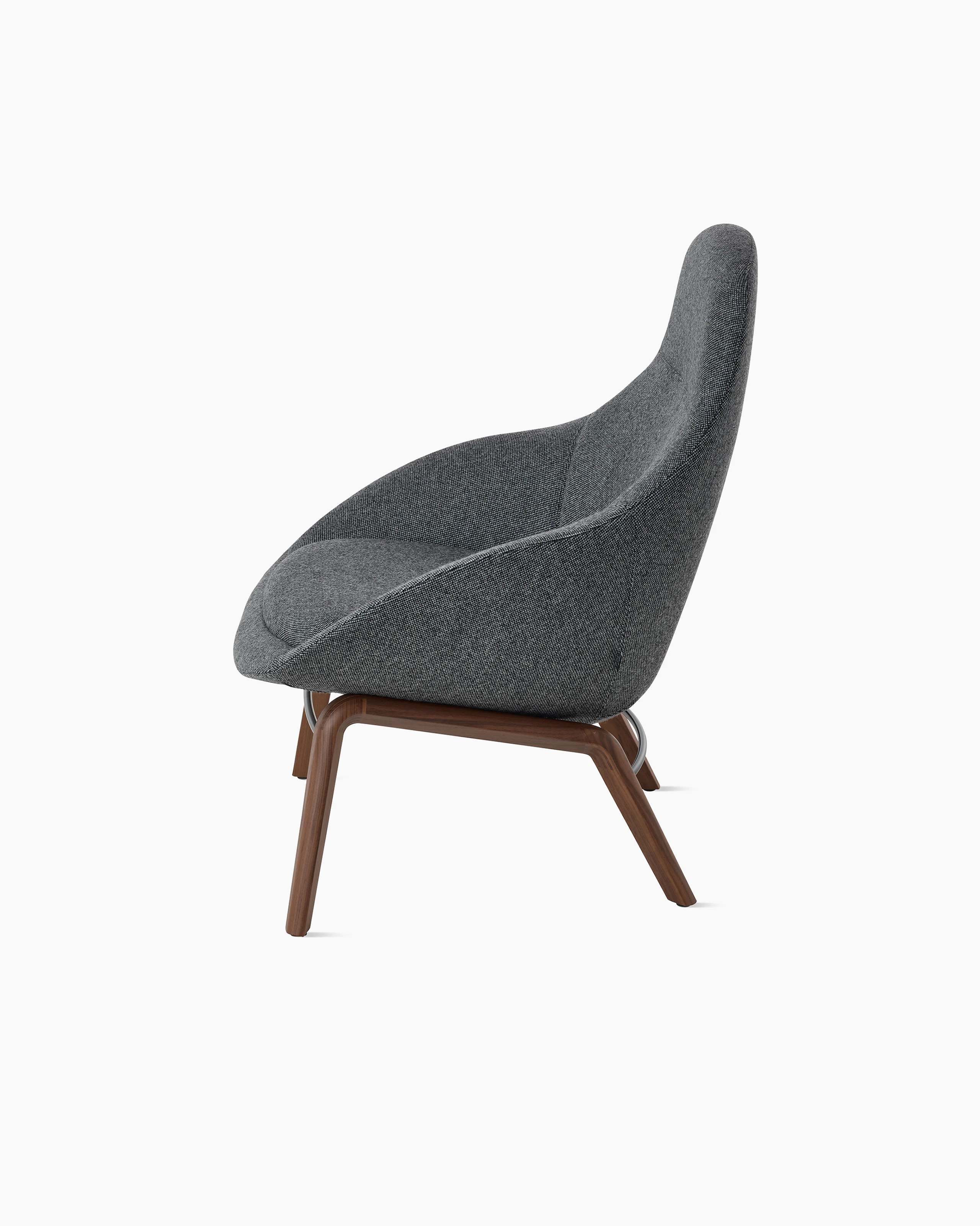 White background shot of Always Lounge Chair with dark grey fabric and wooden legs.