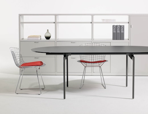 Antenna Workspaces racetrack table and Bertoia side chairs