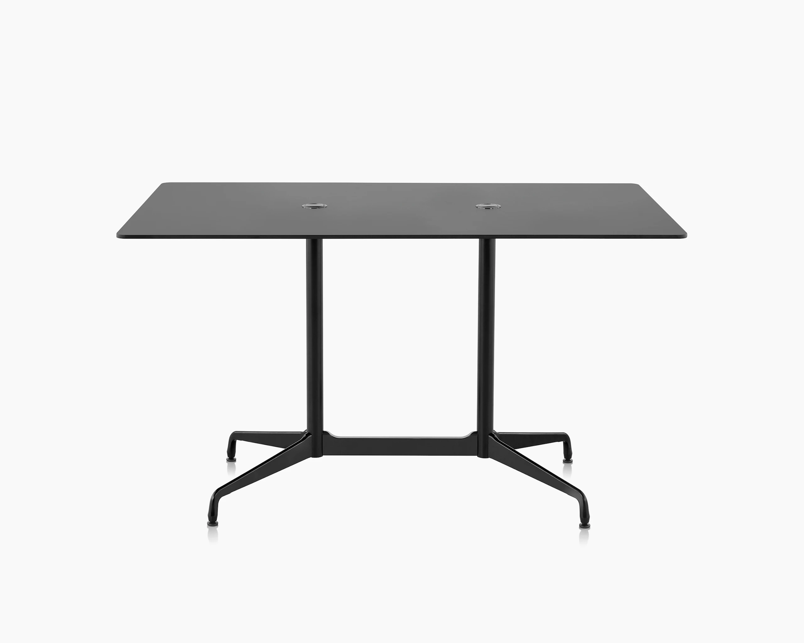 A rectangle Eames Standing Height Table in black with two round cutouts on top and a segmented black base.