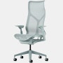 A glacier high-back Cosm Chair with height adjustable arms.
