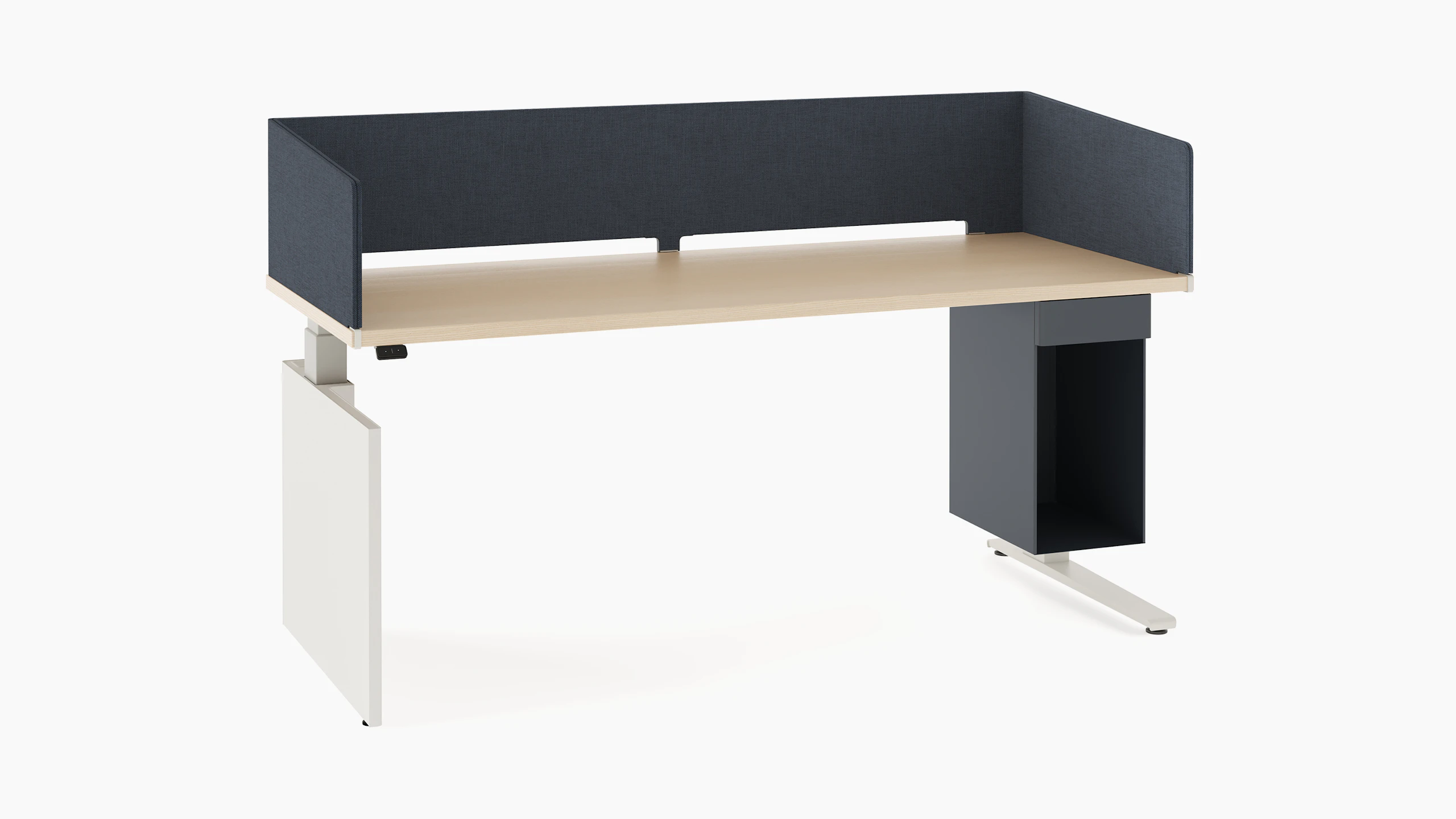 Table with laminate surface, wrapped navy fabric screen, navy large suspended storage, and white shroud on the left leg.