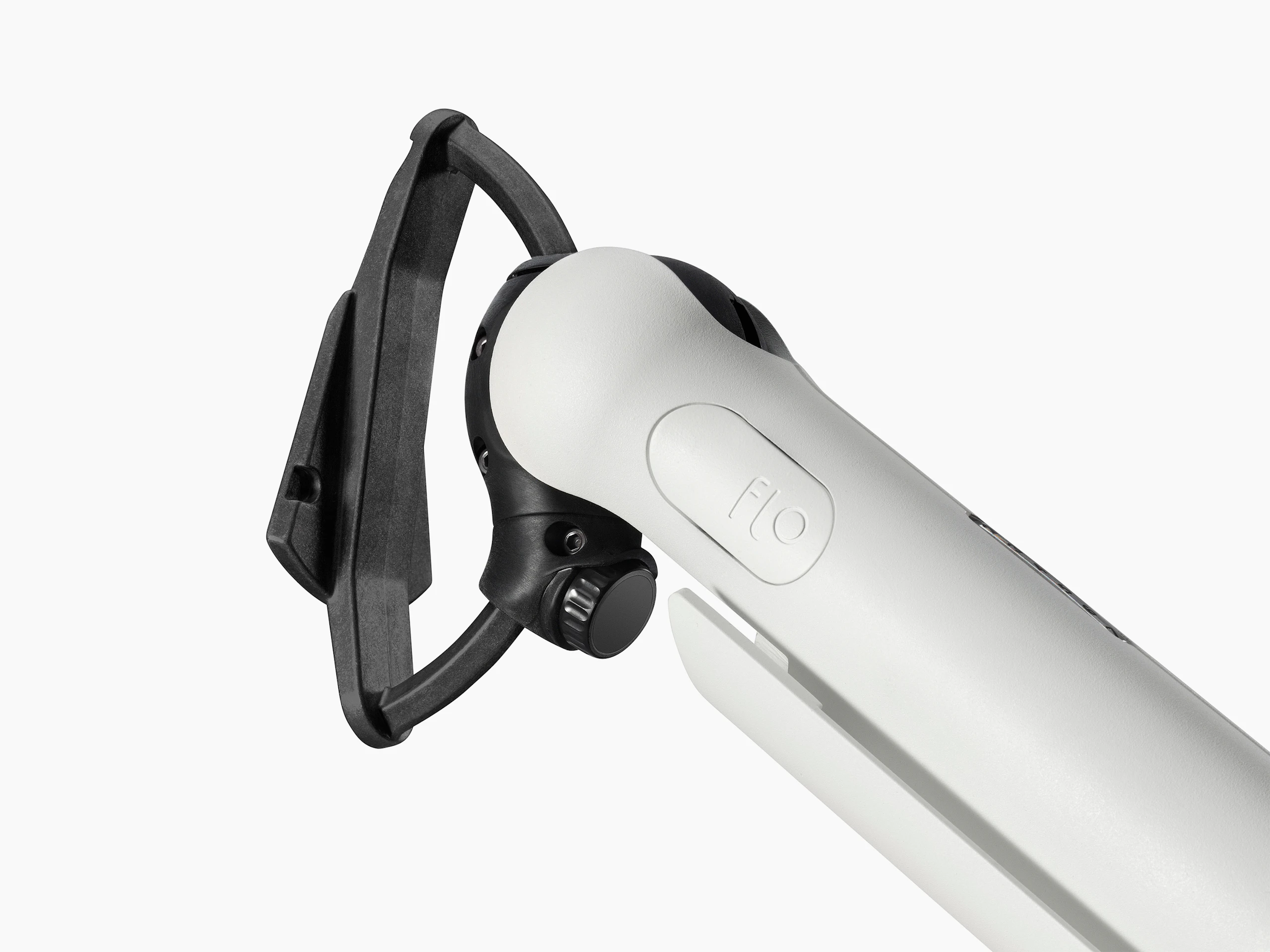 A close up of a white Flo monitor arm with black D ring.