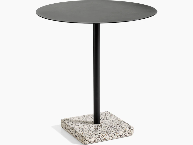 A round Terrazzo Table in black with a grey Terrazzo base.