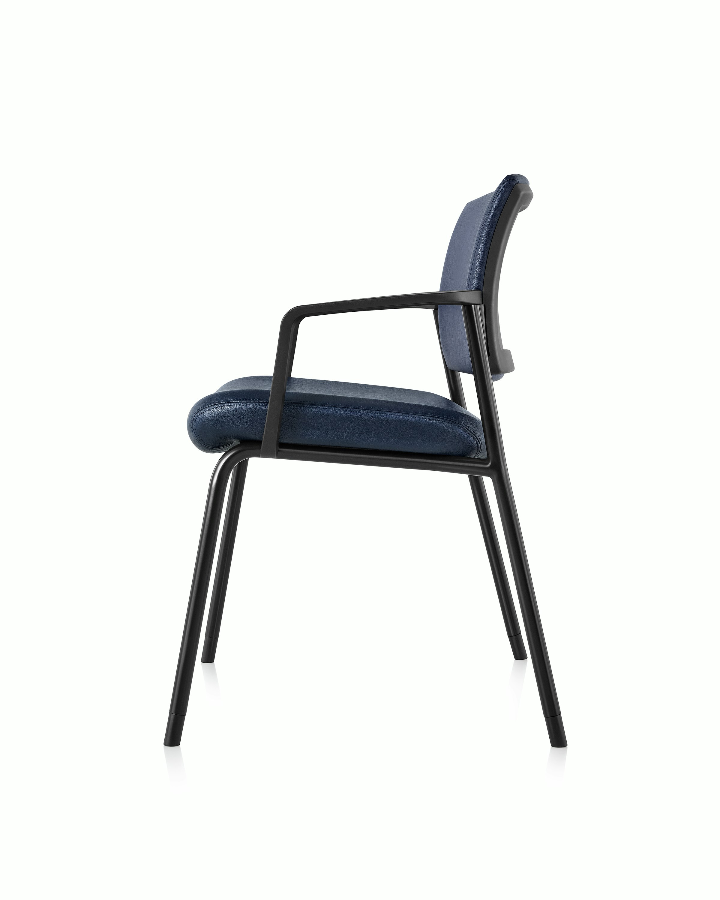 Side view of Verus Plus Chair with arms, in blue vinyl upholstery.