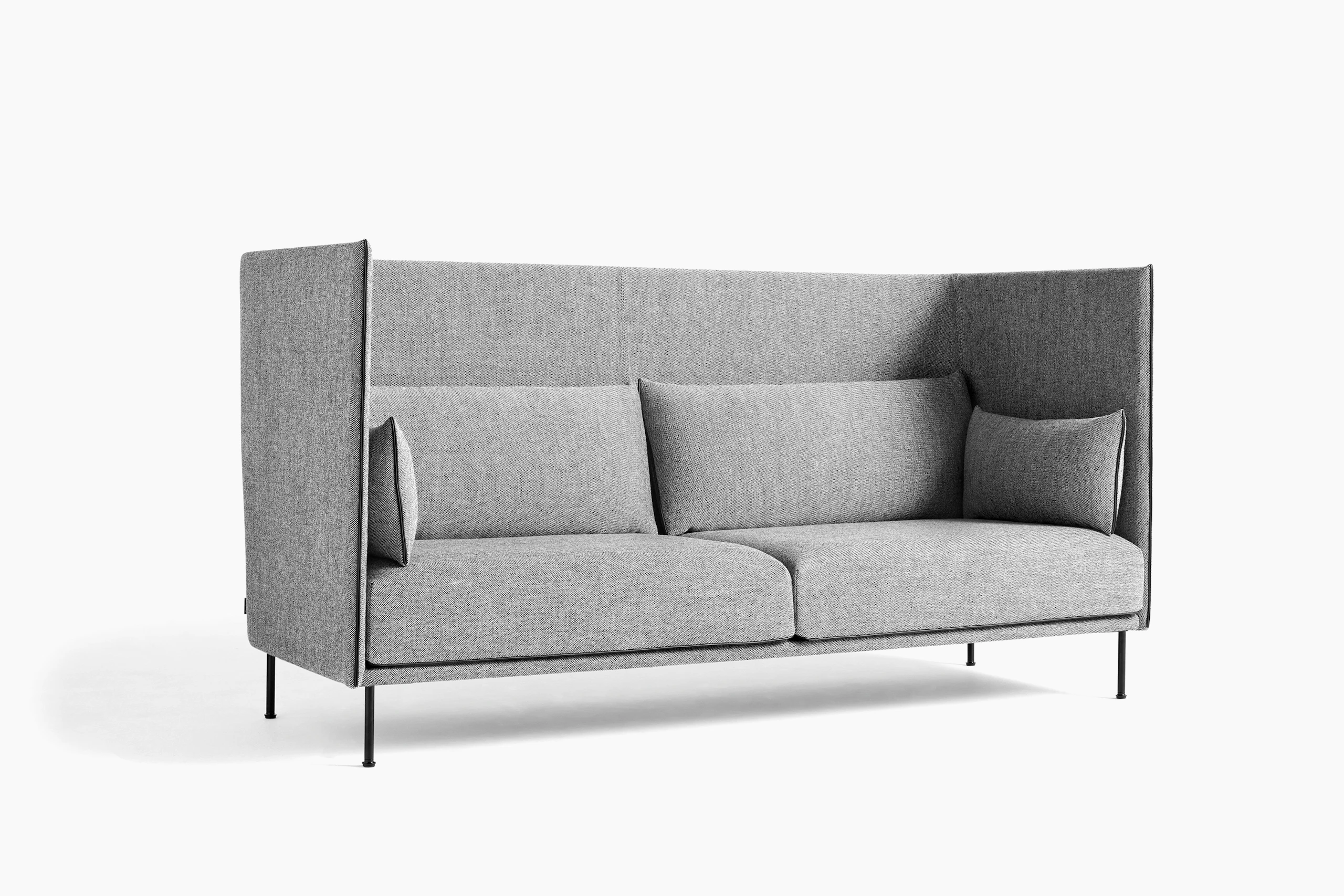 A grey high back Silhouette Sofa.