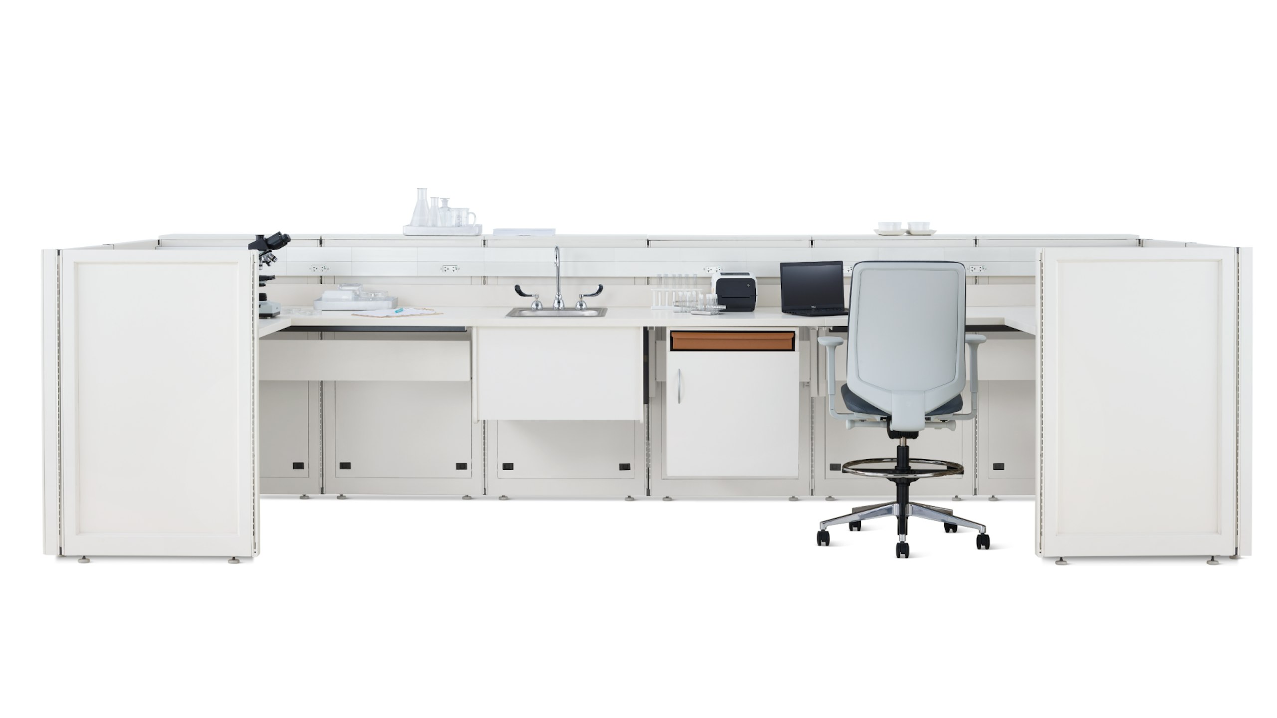 Co/Struc System laboratory bench in soft white with under surface storage, sink, and Verus Stool in light gray.