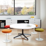 Knoll Dividends Horizon table with Saarinen Tulip stools