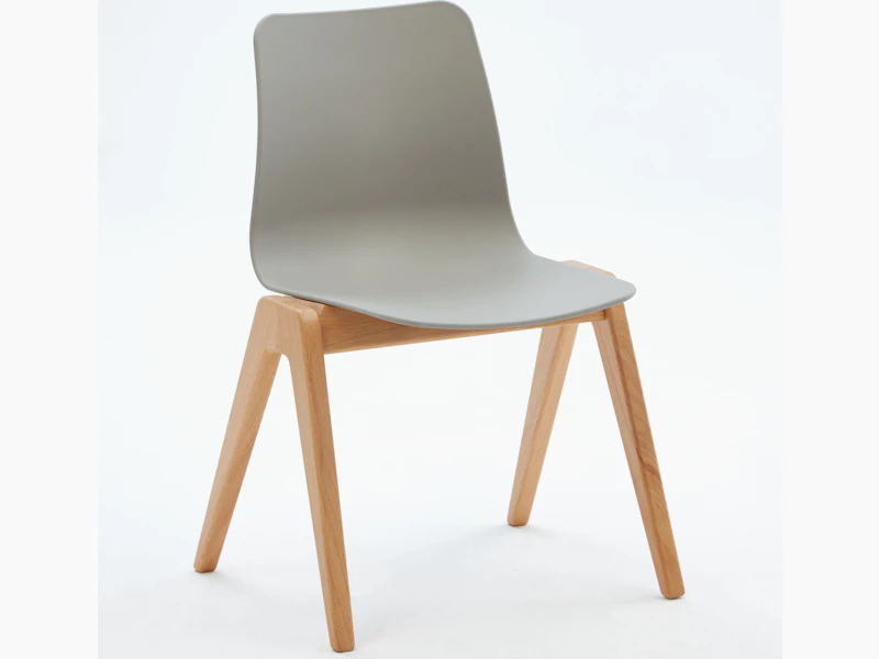 A gray naughtone Polly Wood Chair with an oak base, viewed at an angle.