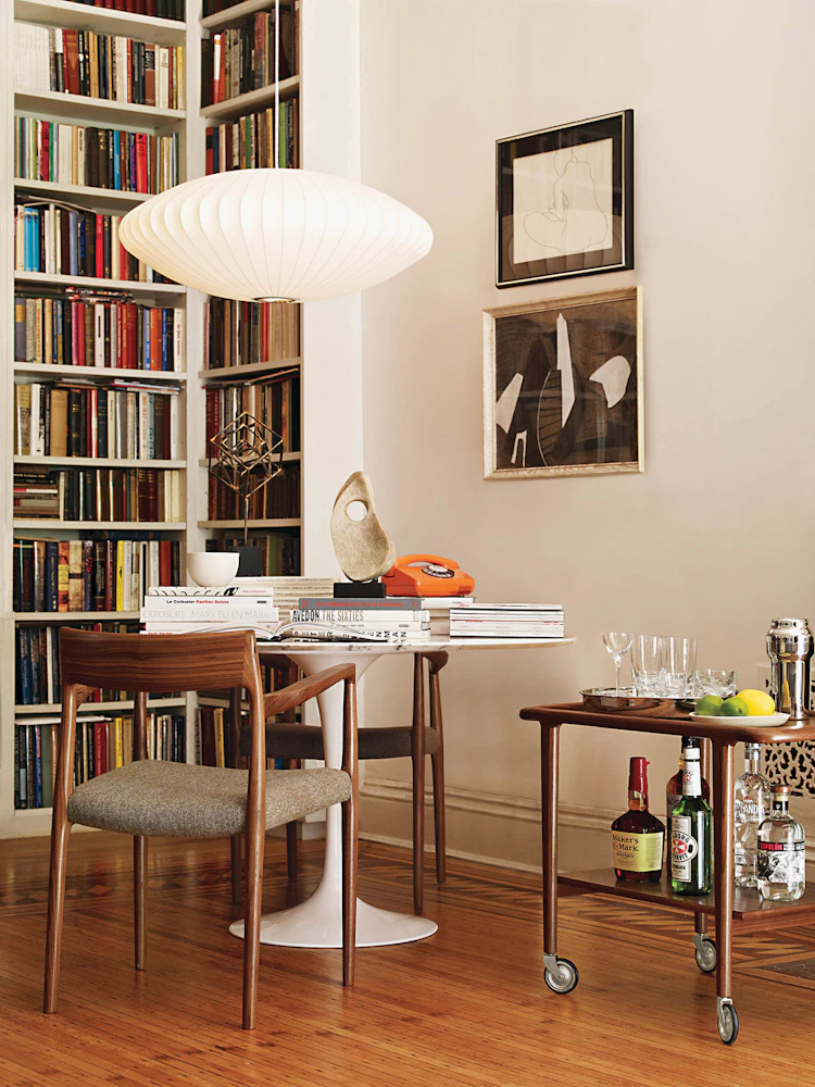 trolley in dining room setting with bookshelves