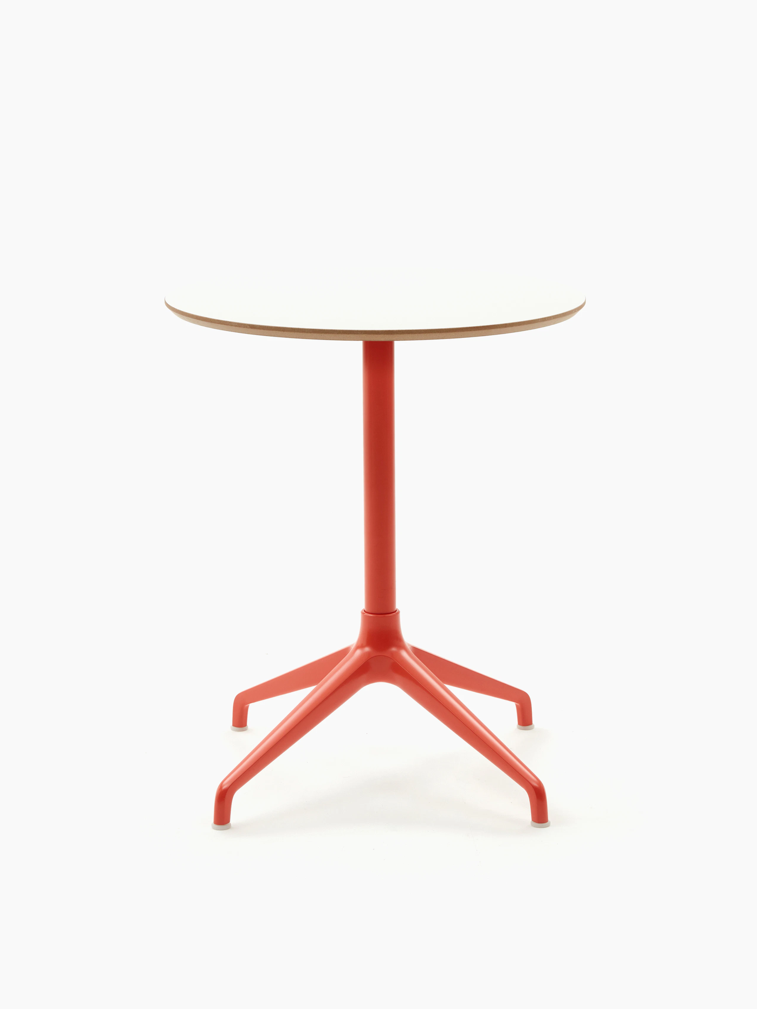 Ali Dining Table with pink 4 star base and white mfmdf circular table top.