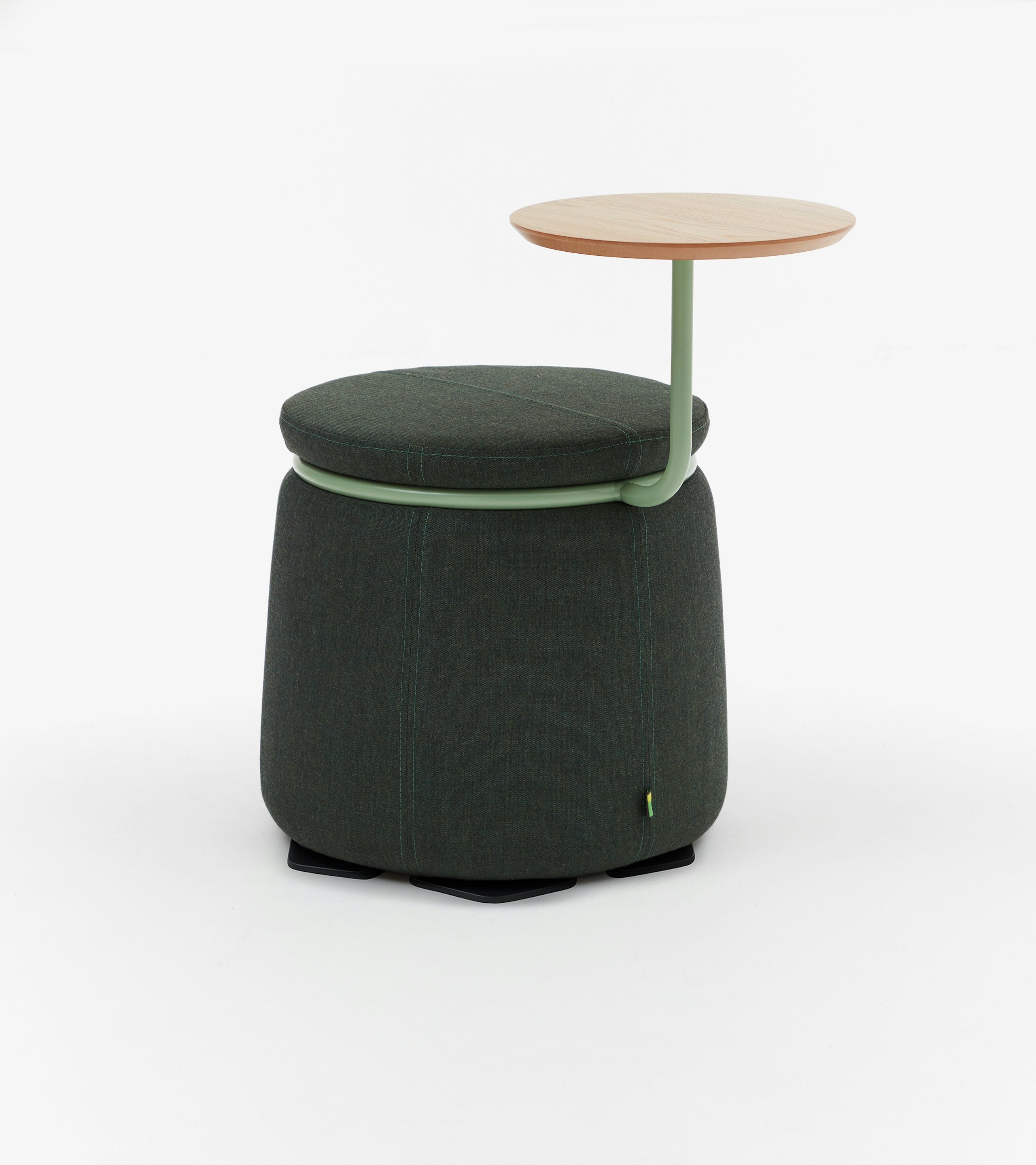 Front view of single seat Lasso stool with green metal table arm holding oak veneer table top, upholstered in dark green fabric.