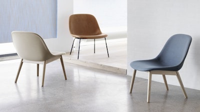 Three Muuto Fiber Lounge Chairs in a variety of materials and colours.